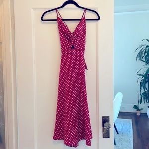 Red polka dot midi dress in a size small